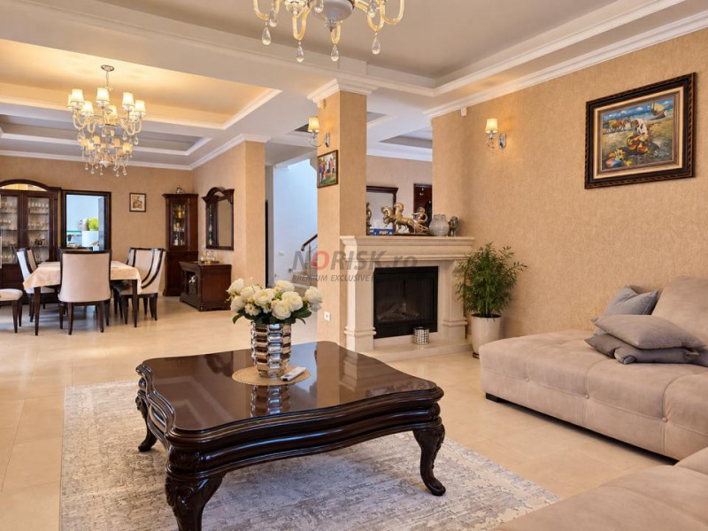 Proprietate exclusivistă cu piscină, garaj și teren de 900 mp