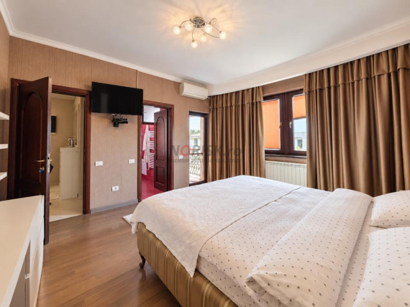 Proprietate exclusivistă cu piscină, garaj și teren de 900 mp