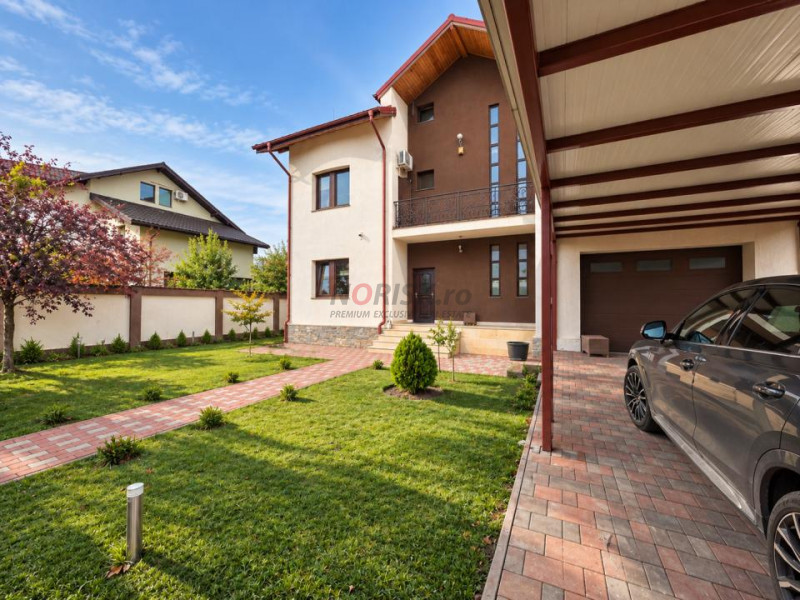 Proprietate exclusivistă cu piscină, garaj și teren de 900 mp
