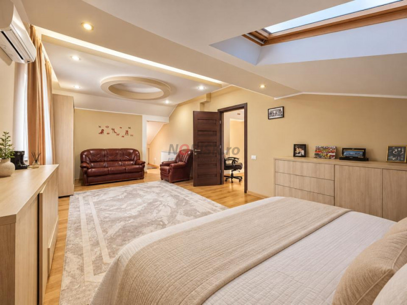 Proprietate exclusivistă cu piscină, garaj și teren de 900 mp
