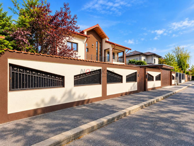 Proprietate exclusivistă cu piscină, garaj și teren de 900 mp
