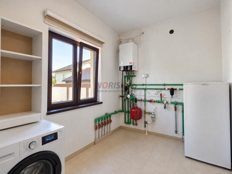 Proprietate exclusivistă cu piscină, garaj și teren de 900 mp